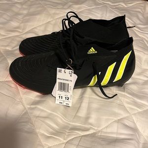Never been worn with tag Men’s adidas predator edge soccer cleats